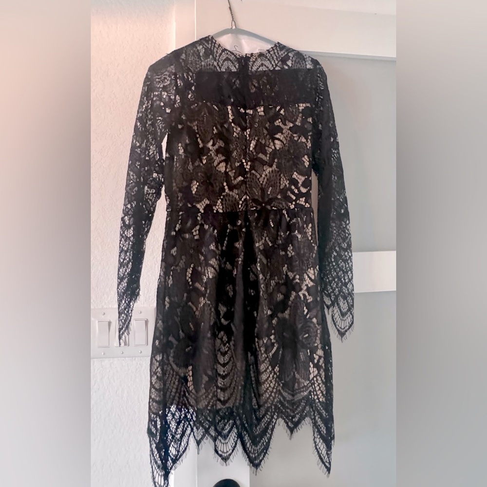 Elegant lace cocktail length dress